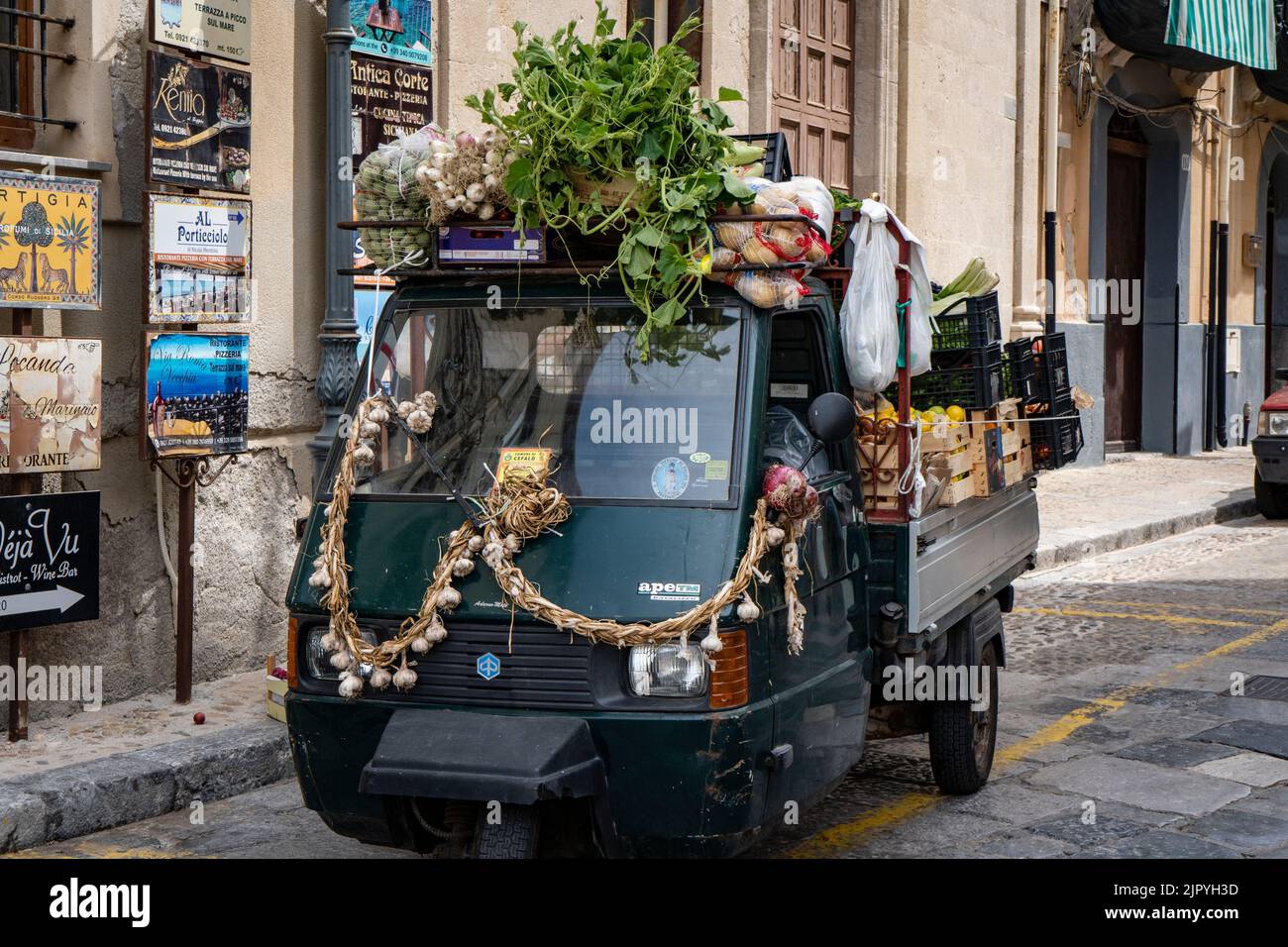 A mini truck delivering fresh vegetables to local stores in Sycylia Stock Photo