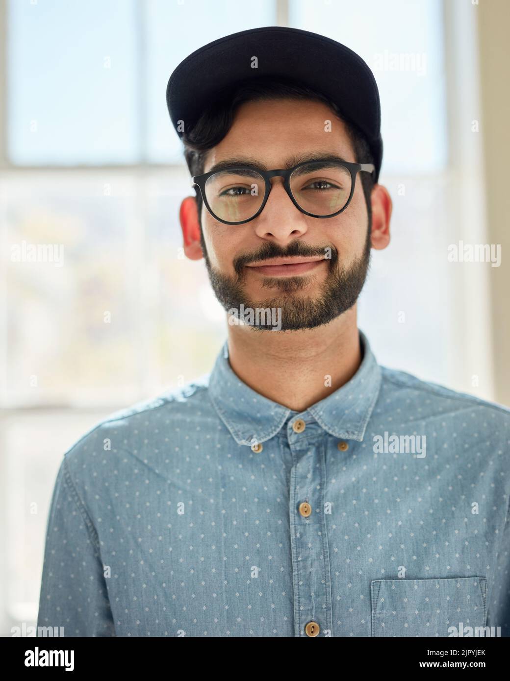 Meet the walking definition of cool and casual. Portrait of a confident