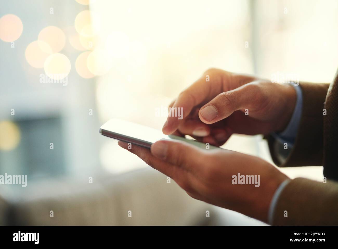 Its as easy as 1 2 3 an unrecognizable businessman using a mobile