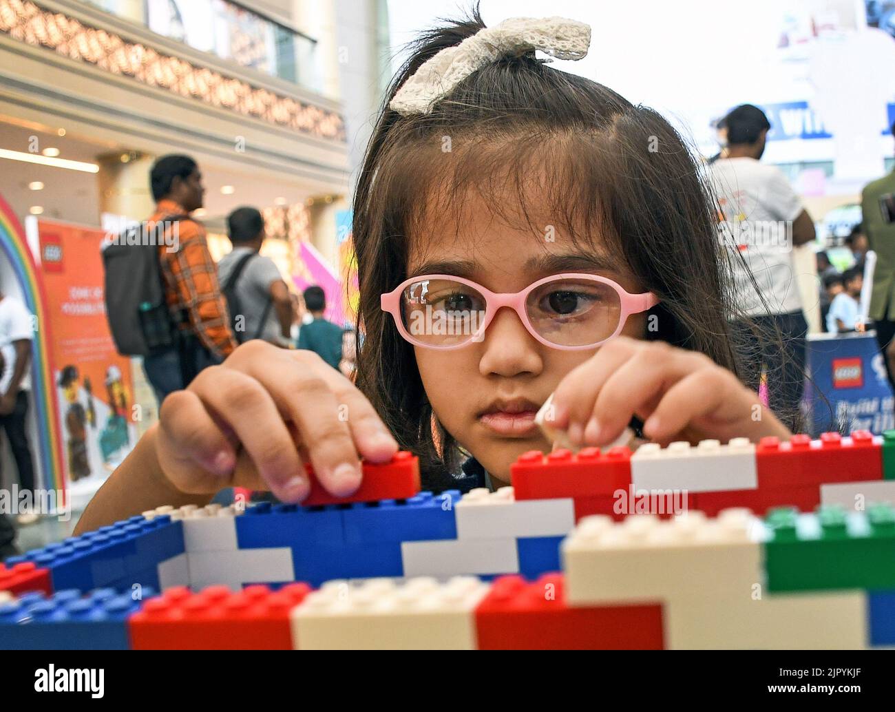 Mumbai, India. 20th Aug, 2022. A girl uses Lego blocks at R City mall in Mumbai. Lego group