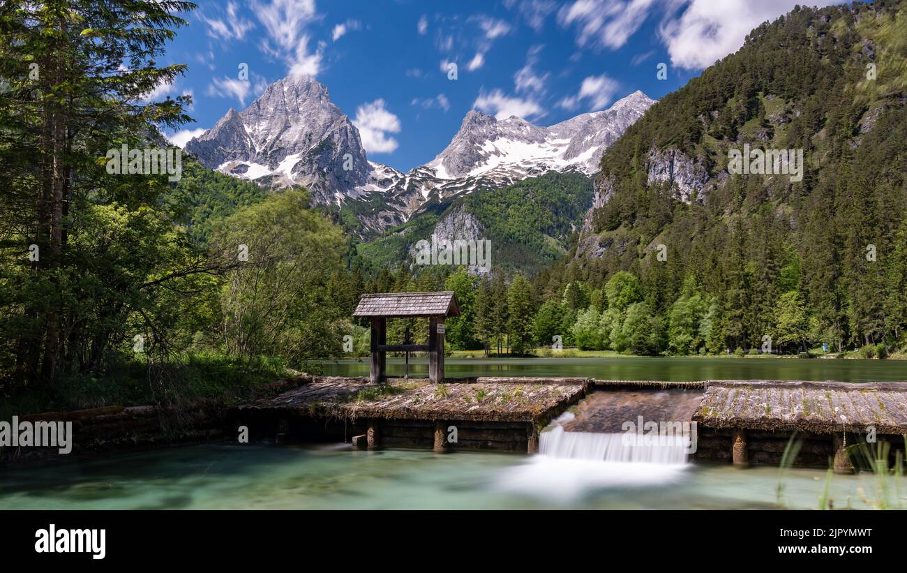 The lake Schiederweiher surrounded with scenic green woods and majestic mountains, Hinterstoder, Austria Stock Photo