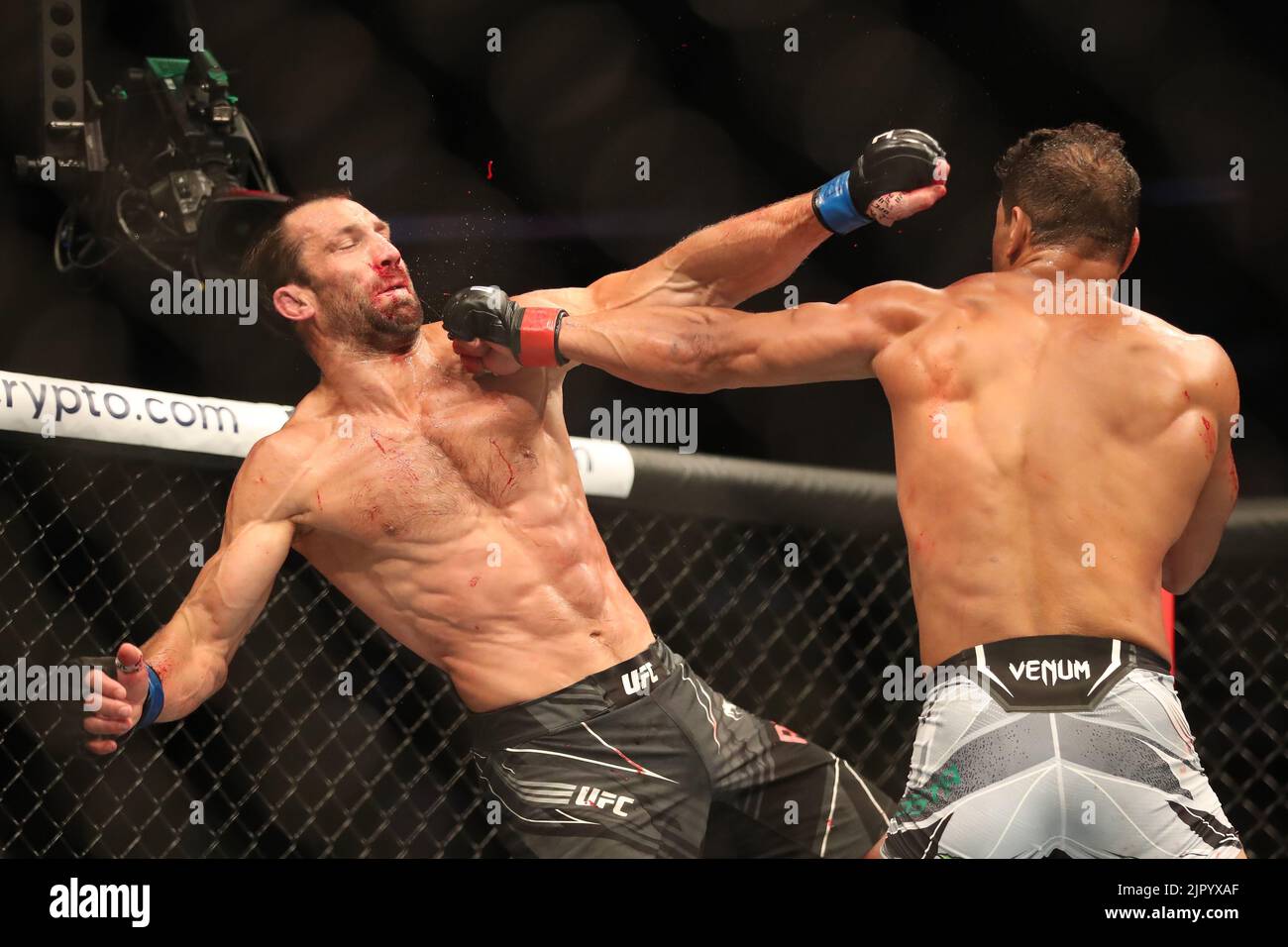 Salt Lake City, United States. 20th Aug, 2022. SALT LAKE CITY, UT - AUGUST 20: (R-L) Paulo Costa punches Luke Rockhold in their Middleweight bout during the UFC 278 at the Vivint Arena on August 20, 2022 in Salt Lake City, Utah, United States. (Photo by Alejandro Salazar/PxImages) Credit: Px Images/Alamy Live News Stock Photo