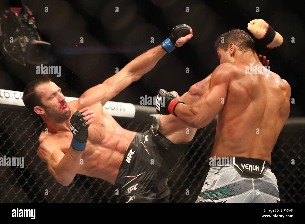 Salt Lake City, United States. 20th Aug, 2022. SALT LAKE CITY, UT - AUGUST 20: (L-R) Luke Rockhold kicks Paulo Costa in their Middleweight bout during the UFC 278 at the Vivint Arena on August 20, 2022 in Salt Lake City, Utah, United States. (Photo by Alejandro Salazar/PxImages) Credit: Px Images/Alamy Live News Stock Photo