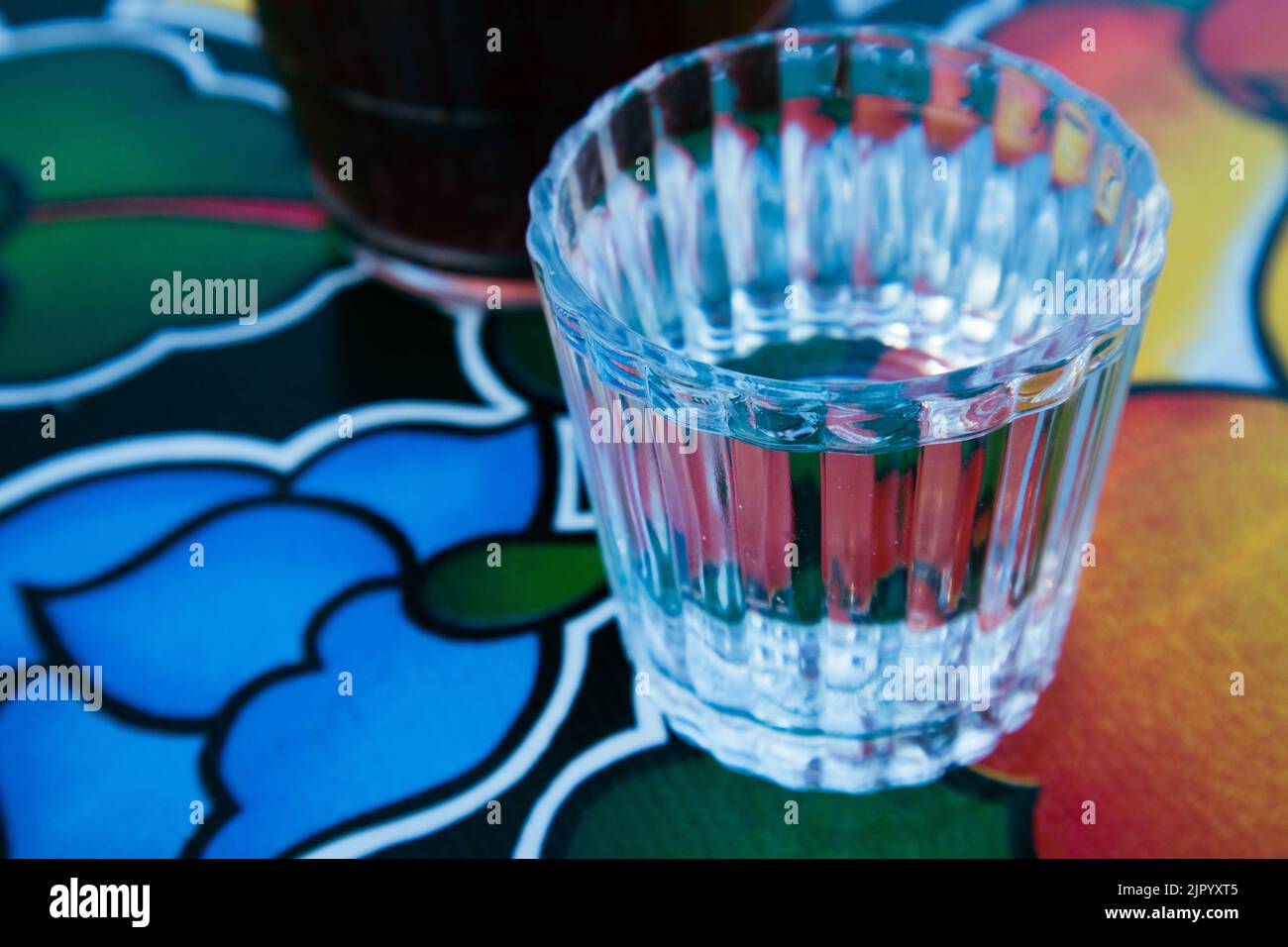 A glass of Mezcal on a table at a bar in Oaxaca City, Mexico Stock