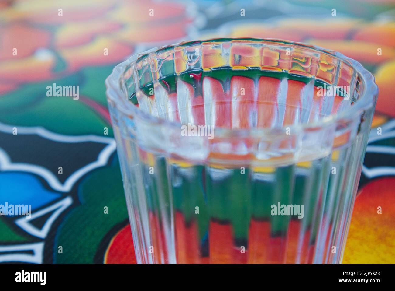 A glass of Mezcal on a table at a bar in Oaxaca City, Mexico Stock