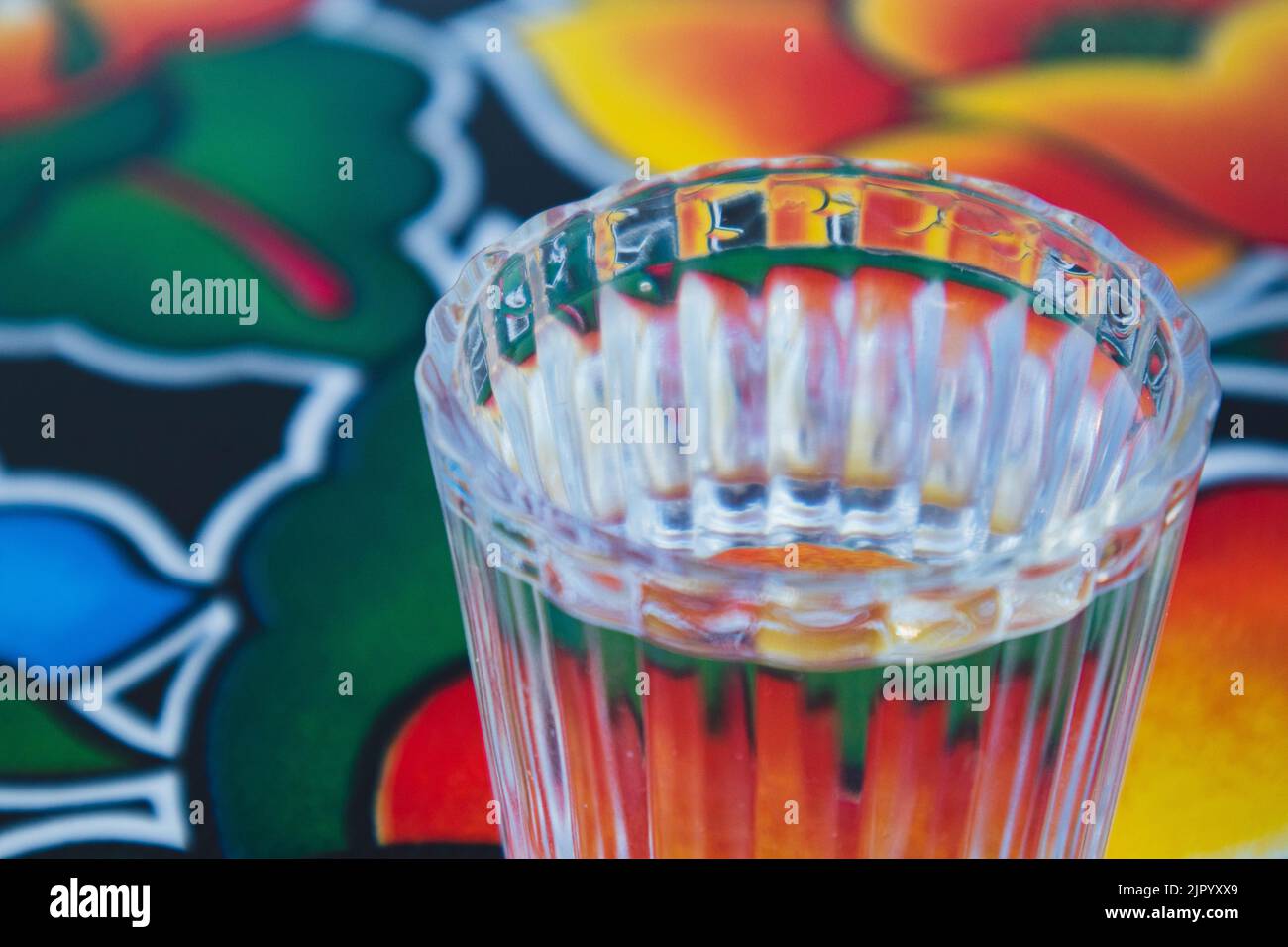 A glass of Mezcal on a table at a bar in Oaxaca City, Mexico Stock