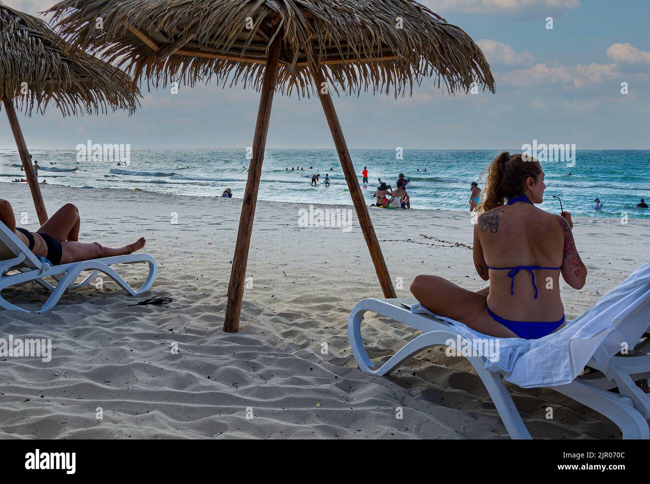 A Cuban woman on vacation in Varadero Beach, Cuba. Stock Photo
