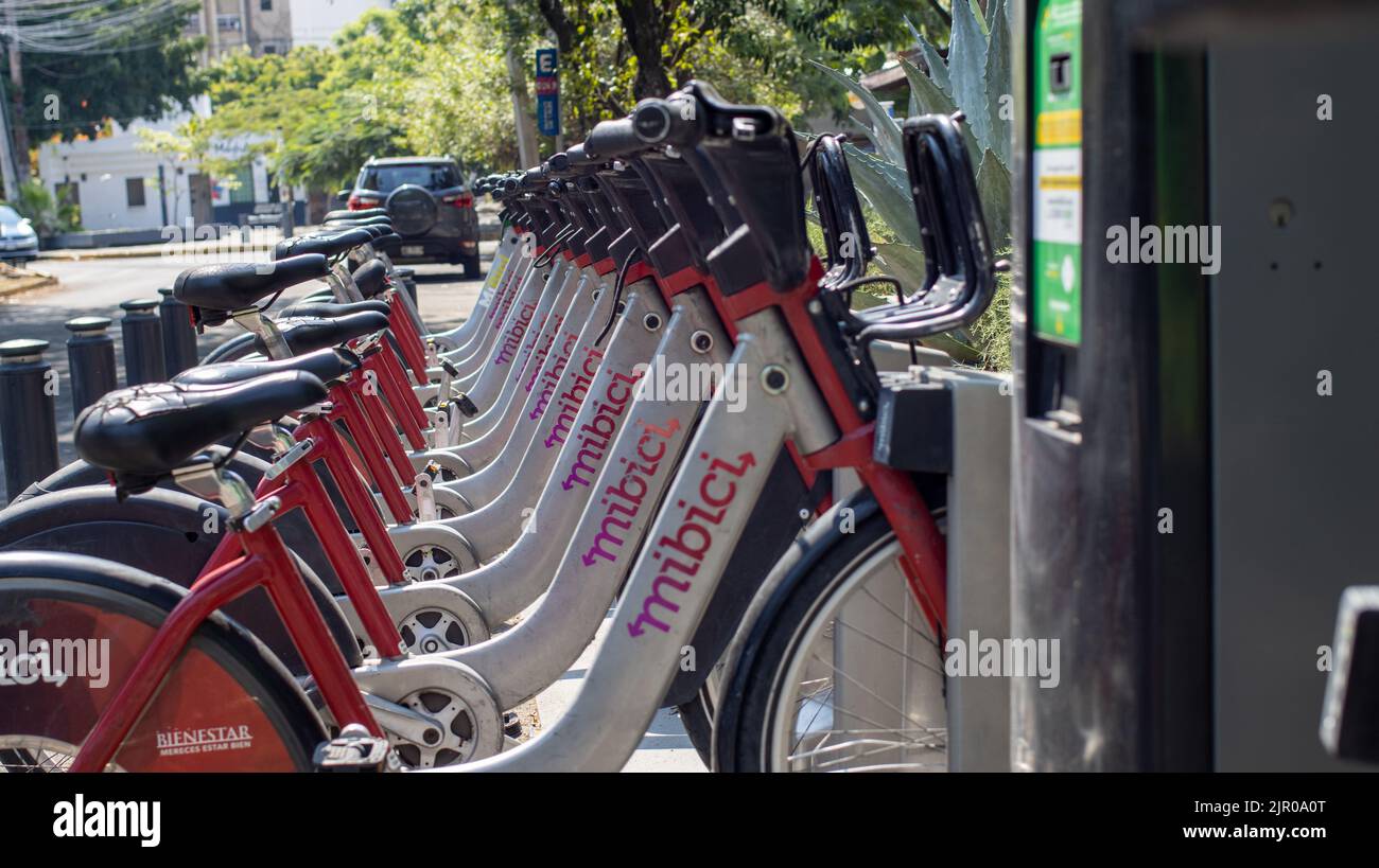 A closeup of a row of rentable 'Mibici' bicycles in the streets of Guadalajara, Mexico Stock Photo