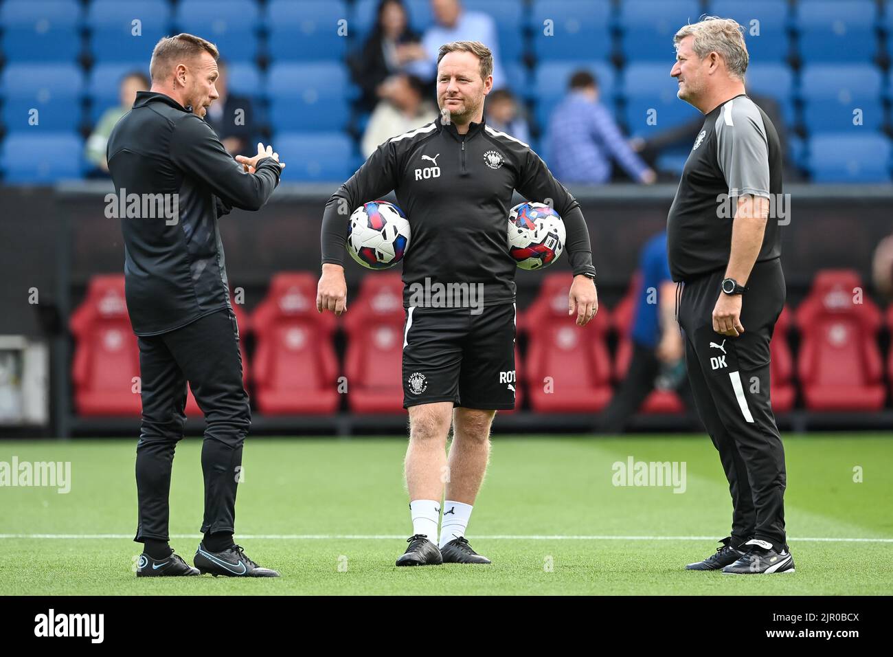 Craig Bellamy Assistant Manager of Burnley chats with David Kerslake and Richard O'Donnell Assistant Head Coach of Blackpool during the pre-game warmup in, on 8/20/2022. (Photo by Craig Thomas/News Images/Sipa USA) Credit: Sipa USA/Alamy Live News Stock Photo