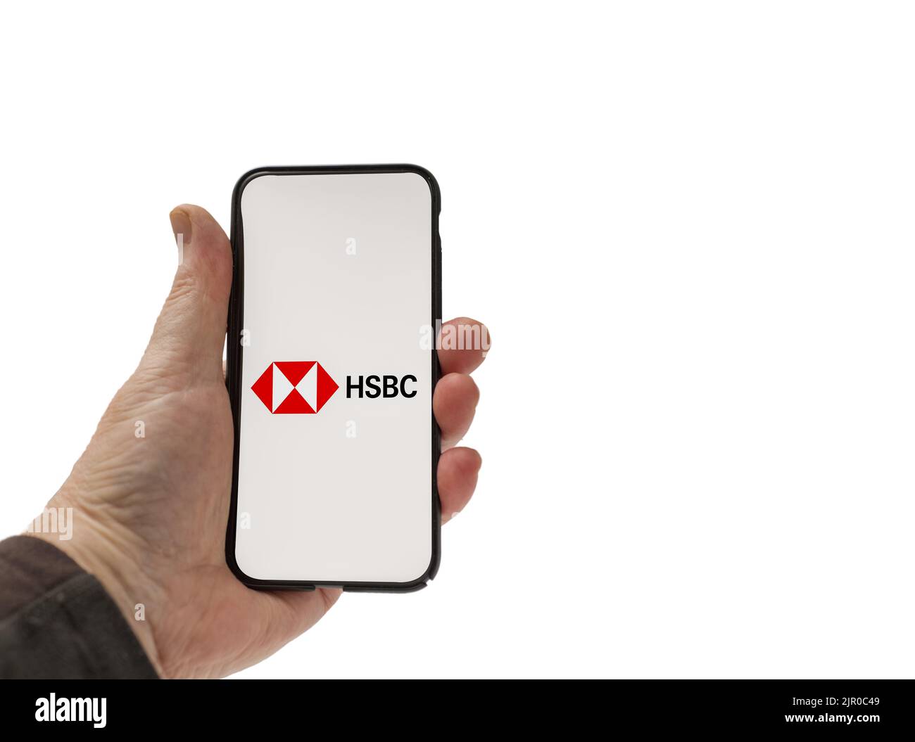 Cardiff Mid Glamorgan UK August 20 2022 person holding cellphone with HSBC Bank  Logo on a white background Stock Photo