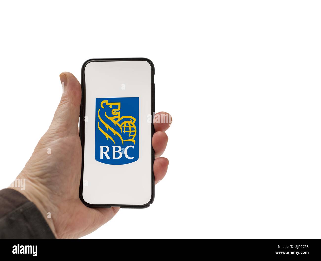 Cardiff Mid Glamorgan UK August 20 2022 person holding cellphone with  RBC Bank Logo on a white background Stock Photo