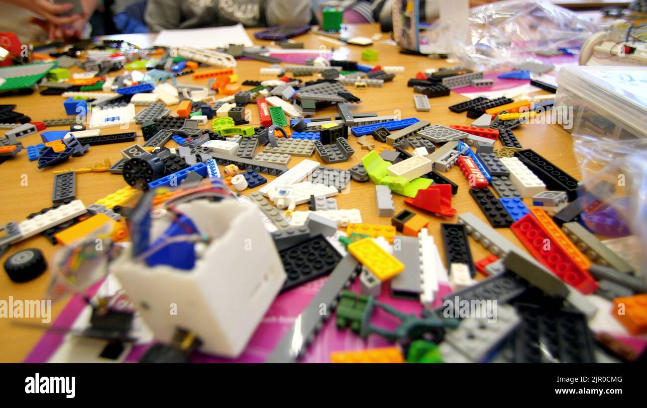 on the table there are scattered a lot of details from the children's ...