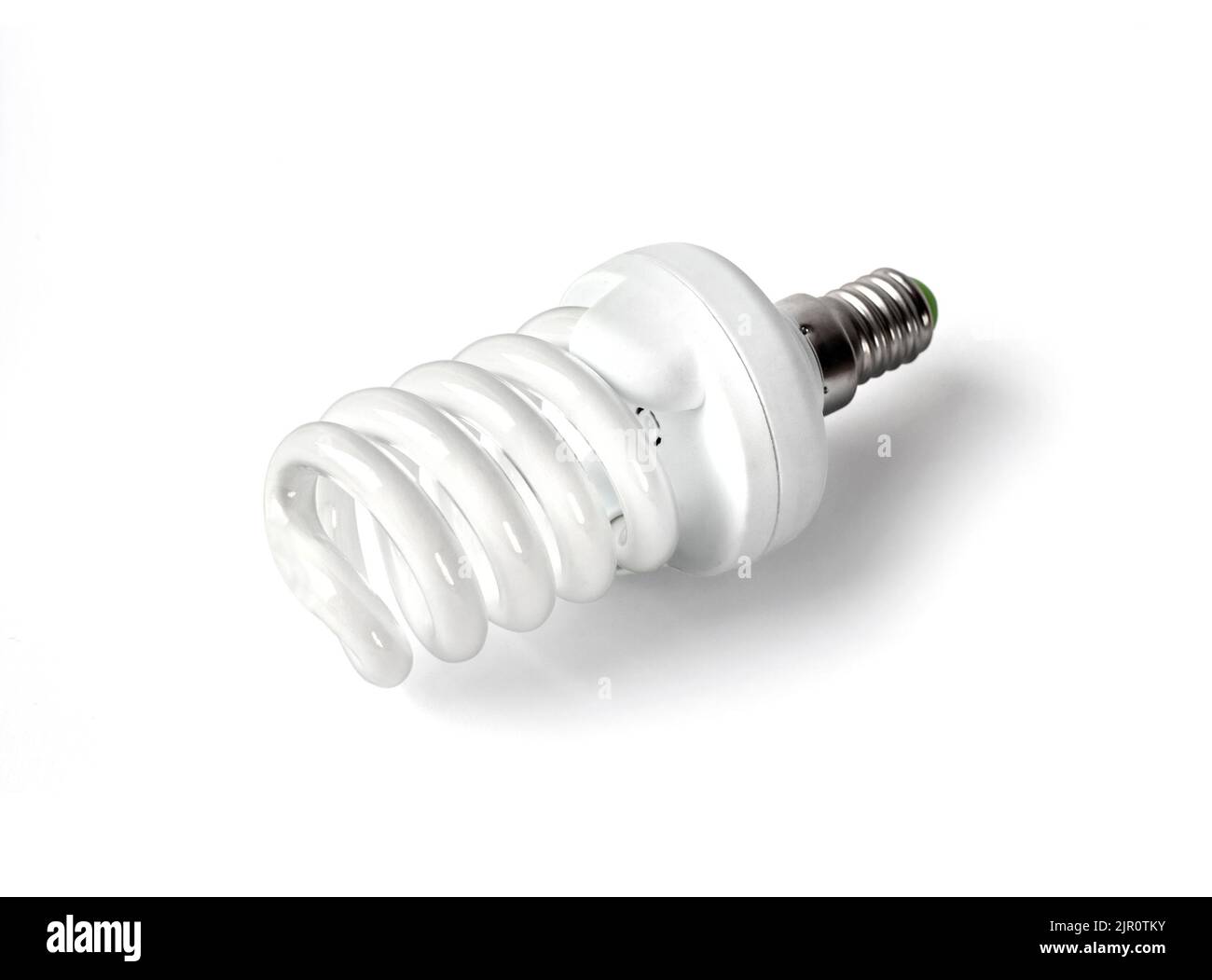 Energy saving fluorescent light bulb on white background isolated with ...