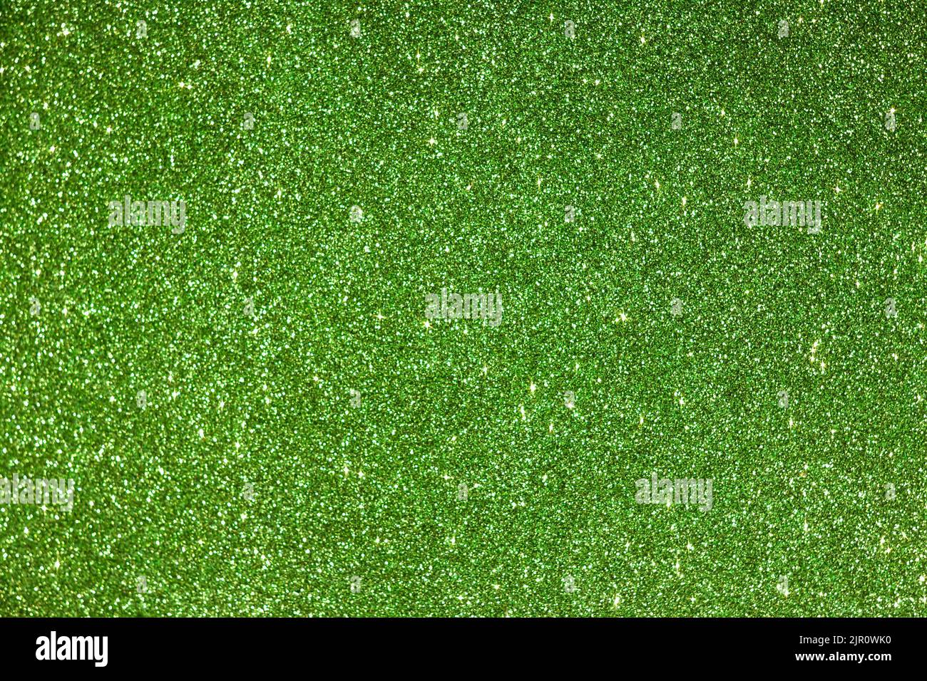 Shiny green foamiran background with glitter effect Stock Photo