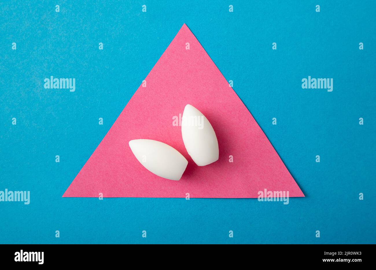 Medicinal bullet shape tablets for vaginal use. Moisturizing treatment. Stock Photo
