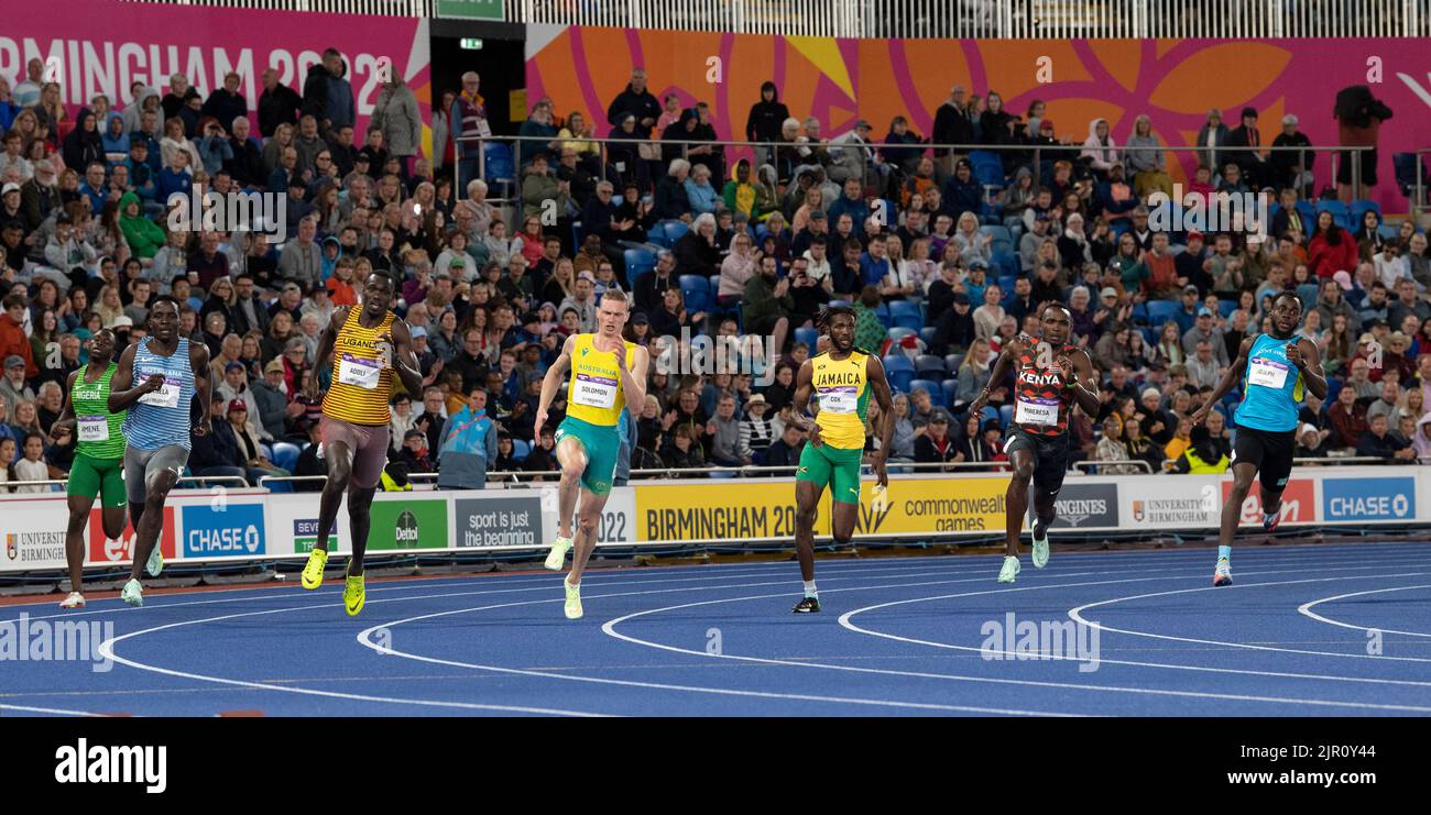 Anthony Pesela, Haron Adoli, Steven Solomon, Anthony Cox and Boniface Ontuga Mweresa competing in the men’s 400m semi final at the Commonwealth Games Stock Photo