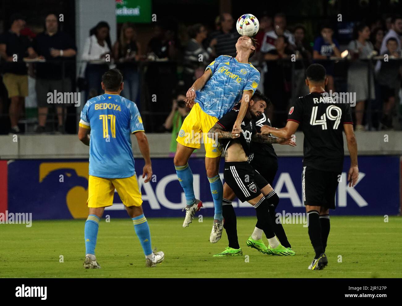 WASHINGTON, DC, USA - 20 AUGUST 2022: Philadelphia Union defender Jack Elliott (3) heads over D.C. United forward Taxiarchis Fountas (11) during a MLS match between D.C United and the Philadelphia Union on August 20, 2022, at Audi Field, in Washington, DC. (Photo by Tony Quinn-Alamy Live News) Stock Photo