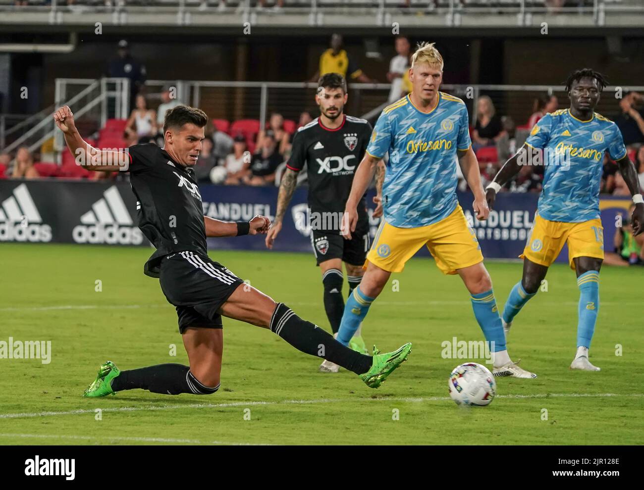 WASHINGTON, DC, USA - 20 AUGUST 2022: D.C. United forwardMi Miguel Barry (22) pushes the ball forward during a MLS match between D.C United and the Philadelphia Union on August 20, 2022, at Audi Field, in Washington, DC. (Photo by Tony Quinn-Alamy Live News) Stock Photo