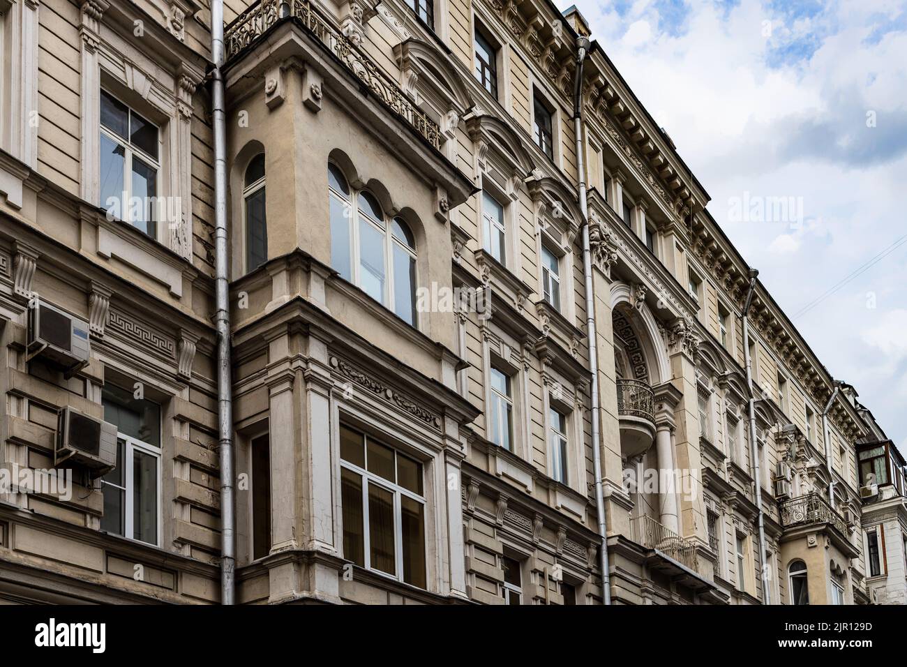 facade of old apartment house on Ostozhenka street in Moscow city in evening Stock Photo