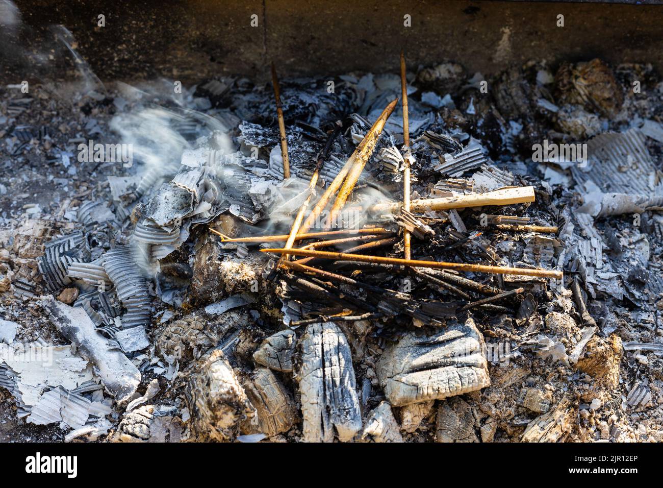 wood chips and twigs for lighting fire inside brazier close up Stock Photo