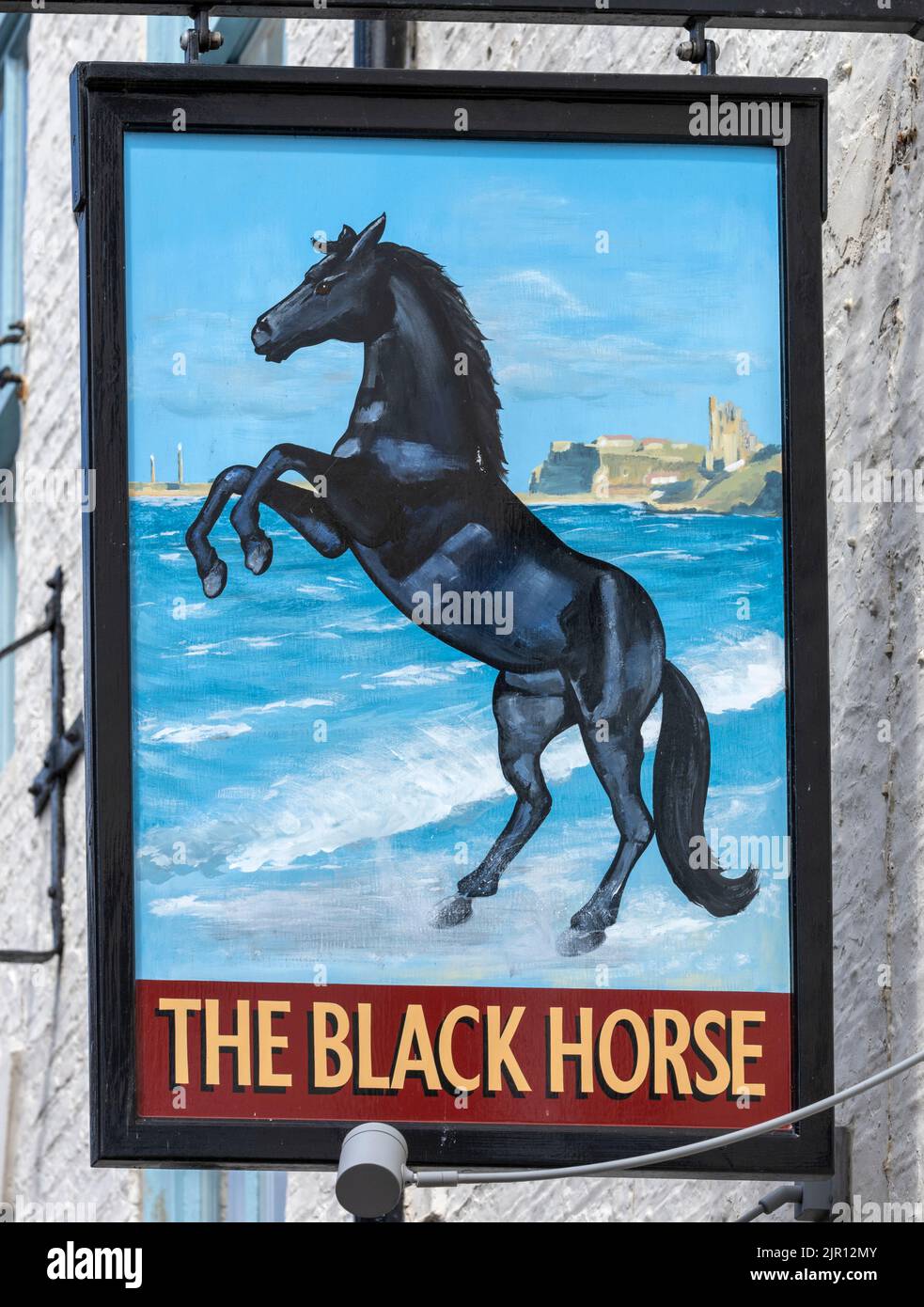 Traditional hanging pub sign at The Black Horse Inn a Tetley Heritage Inn, Church Street, Whitby, Yorkshire, England, UK Stock Photo