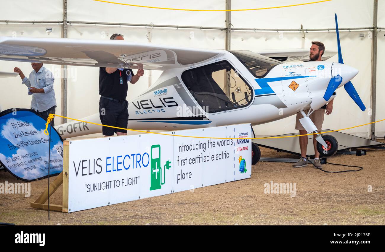 People look at a Pipistrel Velis Electro plane at Eastbourne Airshow 2022 in East Sussex, UK. Stock Photo