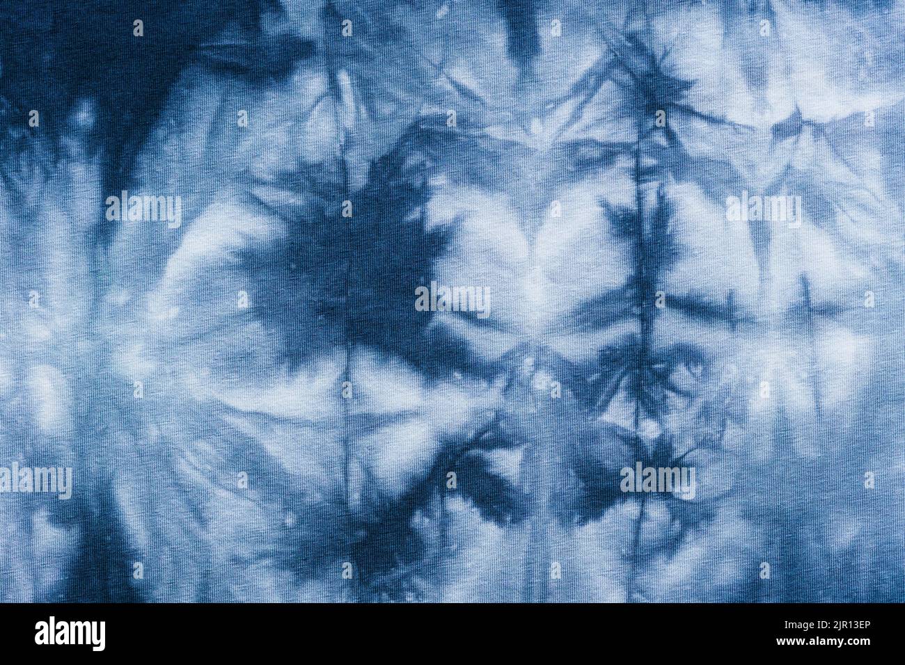 blue gray abstract pattern handcrafted in Shibori technique on cotton jersey fabric Stock Photo