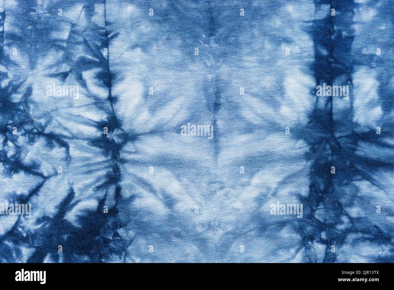 blue gray abstract pattern handcrafted in manual tie-dyeing technique on cotton jersey fabric Stock Photo