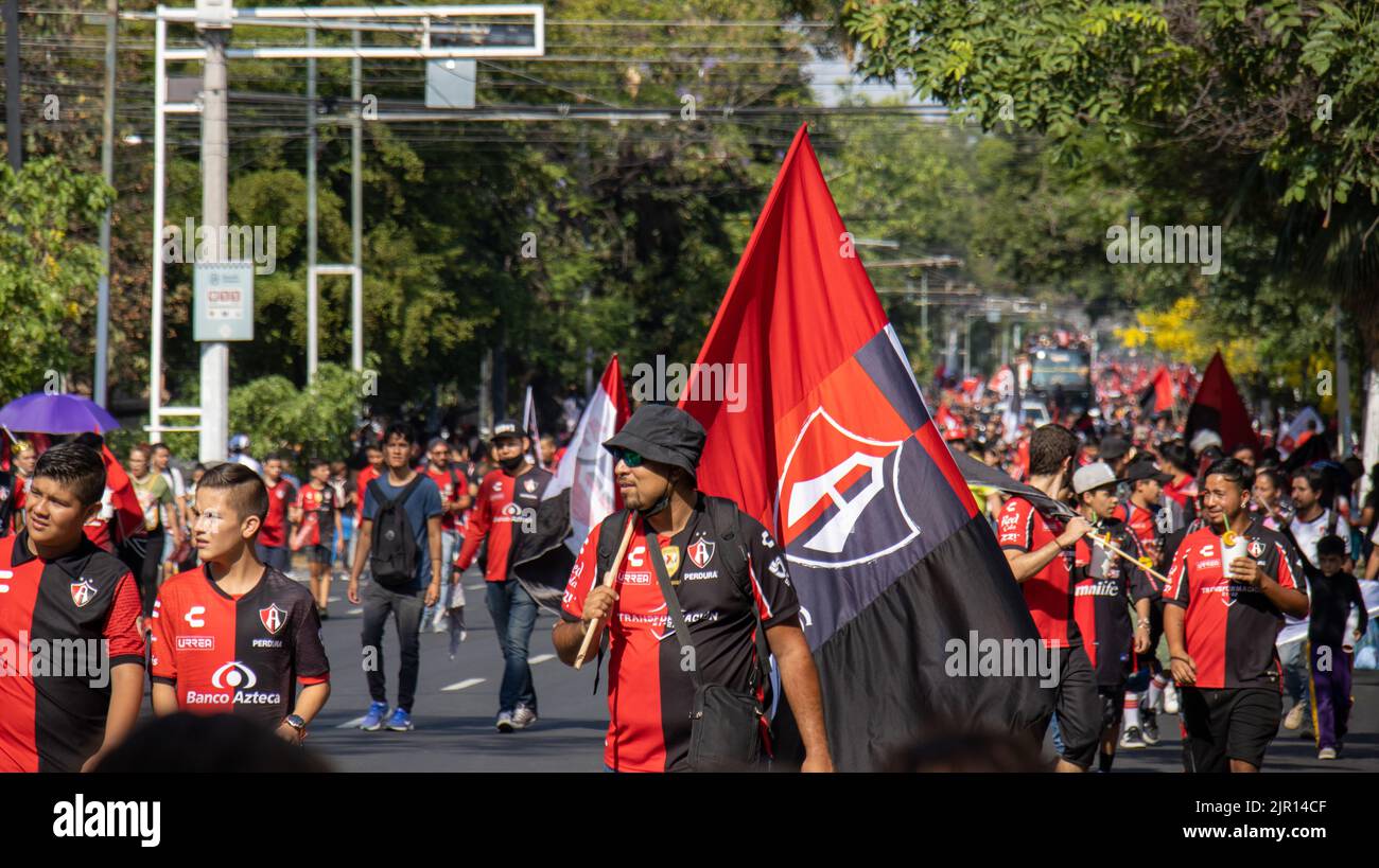 A view of Atlas soccer team fan march during championship parade proudly carrying the Atlas Flag Stock Photo