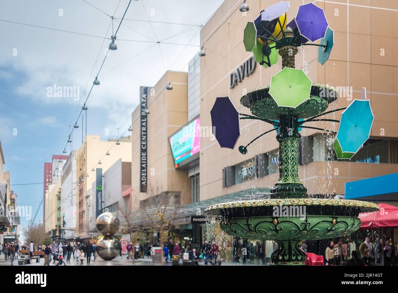 Adelaide, South Australia - August 10, 2019: Iconic Adelaide Arcade fountain viewed along the Rundle Mall after the rain Stock Photo