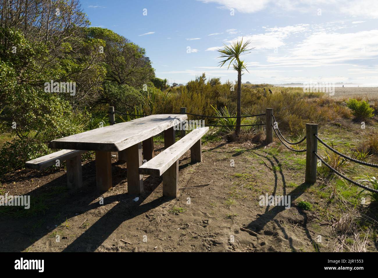 Picnic table and bench near Sumner Beach Christchurch New Zealand Stock