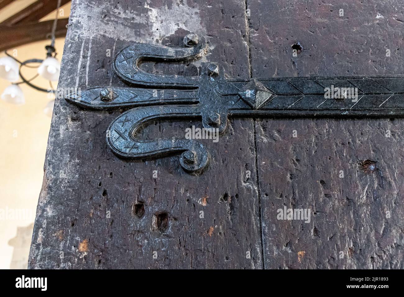 Church of St Lawrence, Alton, Hampshire, England, UK. The historic oak doors with bullet holes from the Battle of Alton in the English Civil War Stock Photo