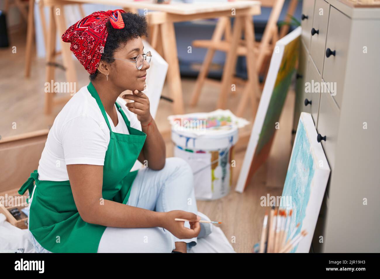 African american woman artist drawing at art studio Stock Photo - Alamy