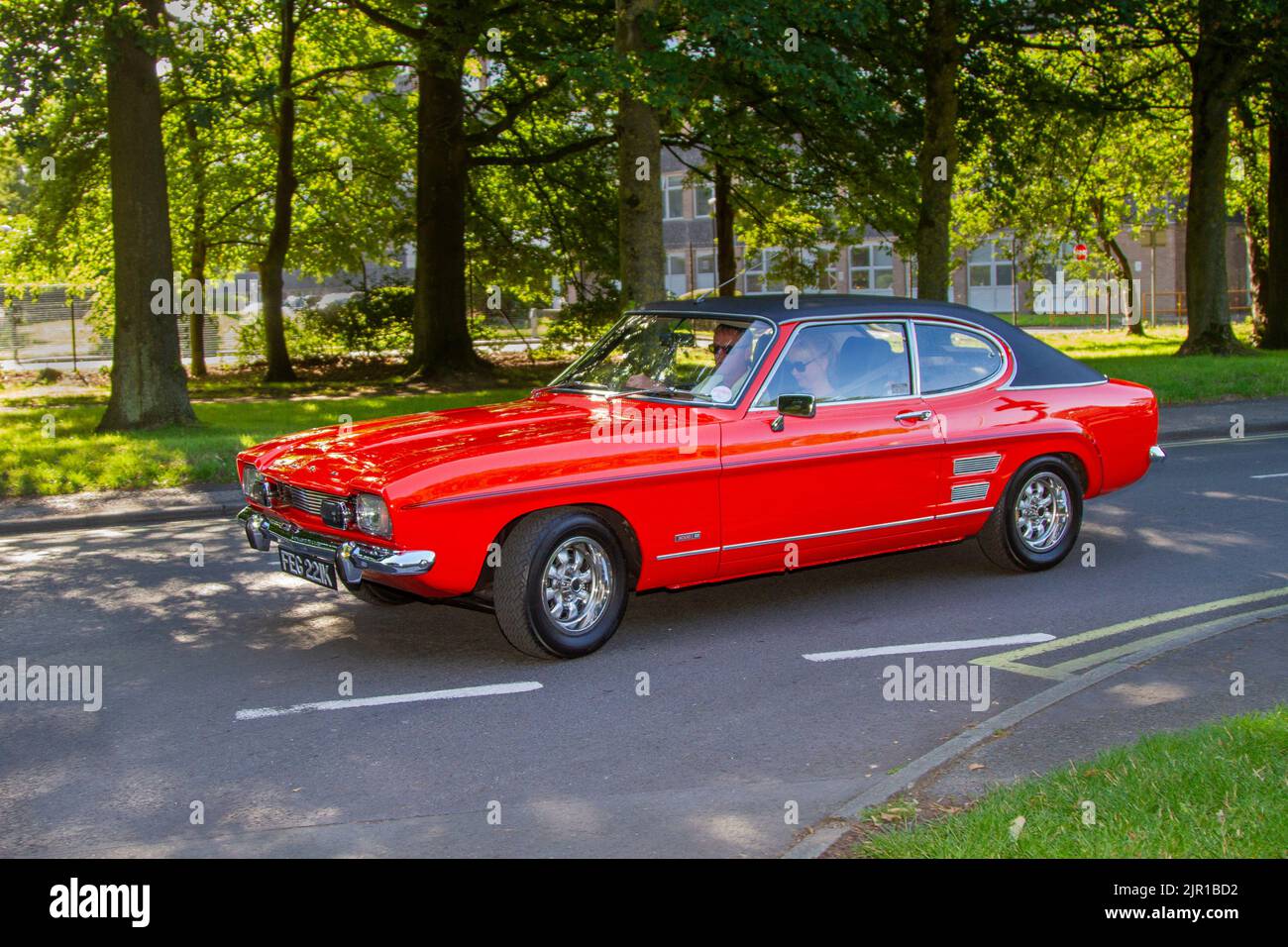 1972 70s seventies Red FORD CAPRI 2998cc petrol roadster; Vintage motors, and cars on display at the 13th Lytham Hall Summer Classic Car & Show, a Classic Vintage Collectible Transport Festival, Blackpool, UK Stock Photo