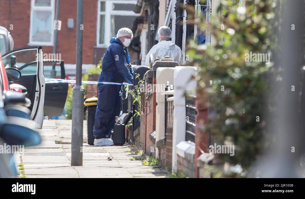 Forensic officers on Leinster Road in Old Swan, Liverpool, after a