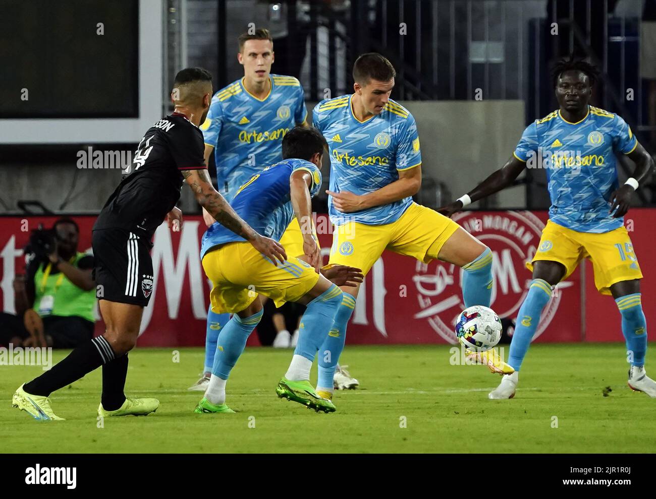 WASHINGTON, DC, USA - 20 AUGUST 2022: Philadelphia defense controls the ball from D.C. United midfielder Victor Palsson (44) during a MLS match between D.C United and the Philadelphia Union on August 20, 2022, at Audi Field, in Washington, DC. (Photo by Tony Quinn-Alamy Live News) Stock Photo