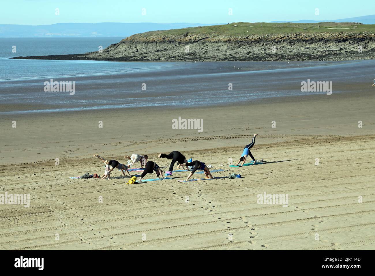 Exercising on the beach. Stock Photo