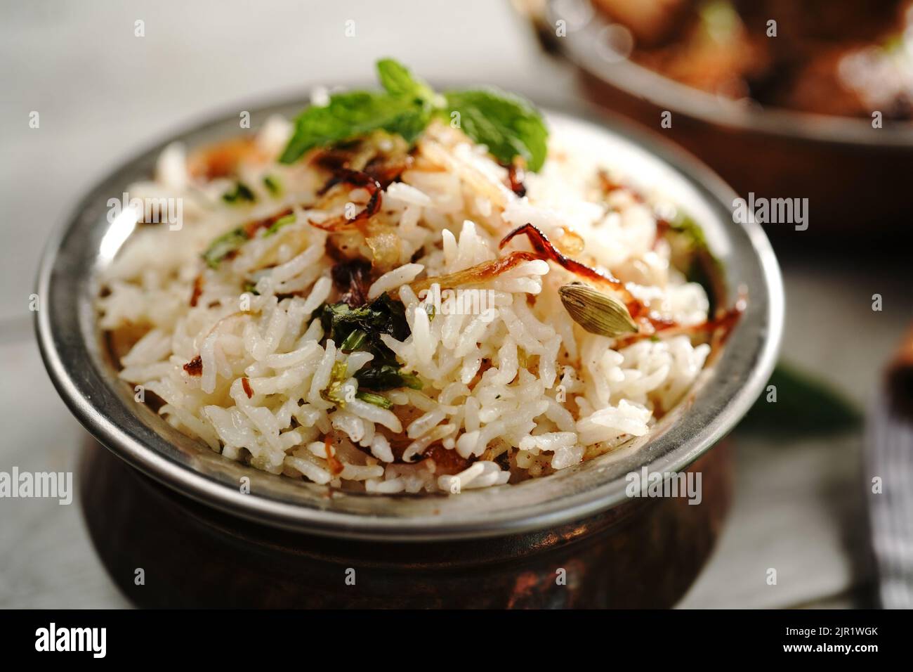 Malabar Ghee Rice or Nei choru with chicken curry, selective focus Stock Photo