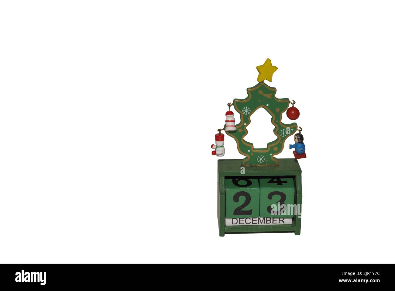 Close up view of green cube  calendar showing 23 December. White background. Sweden. Stock Photo