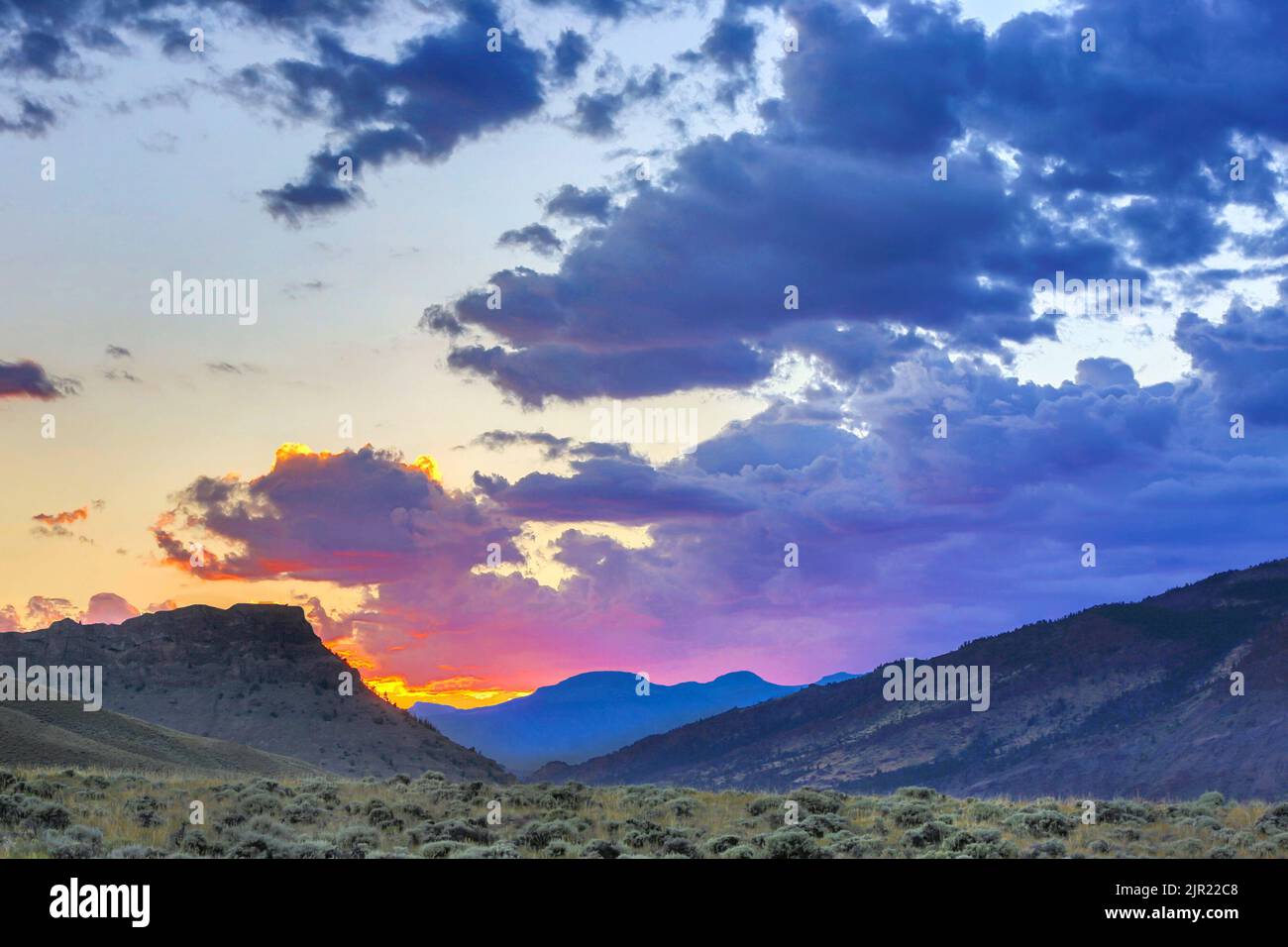Sunset on the Absaroka Mountain Range of the Rocky Mountains east of Yellowstone Park, Wyoming Stock Photo