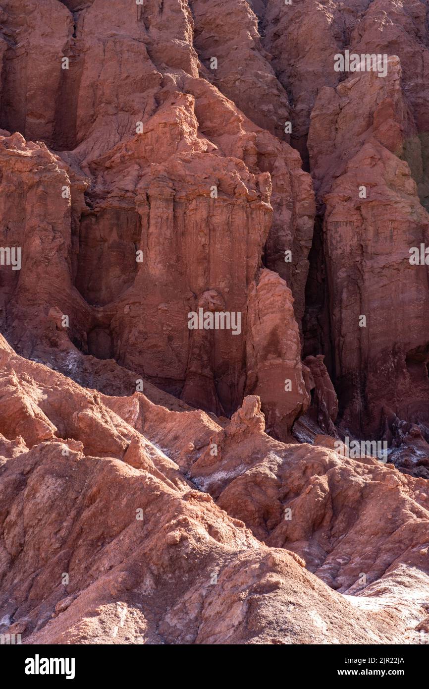 Eroded geological formations in Valle del Arcoiris or Rainbow Valley near San Pedro de Atacama, Chile. Stock Photo
