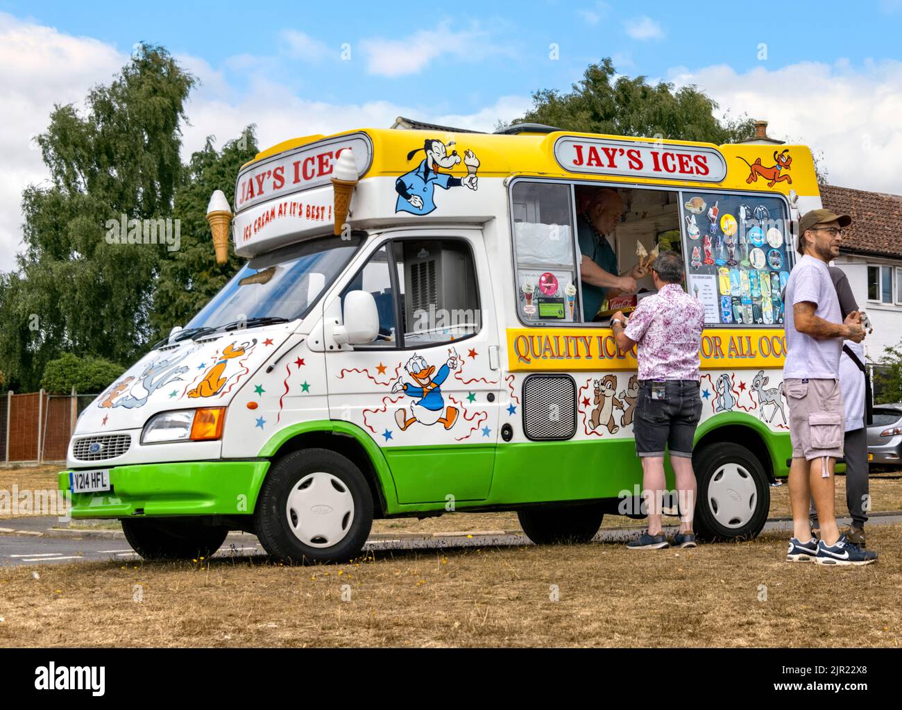Flamstead Hertfordshire - people in a queue for ice creams at Jay's Ice Cream Van - Flamstead scarecrow festival 2022 Stock Photo