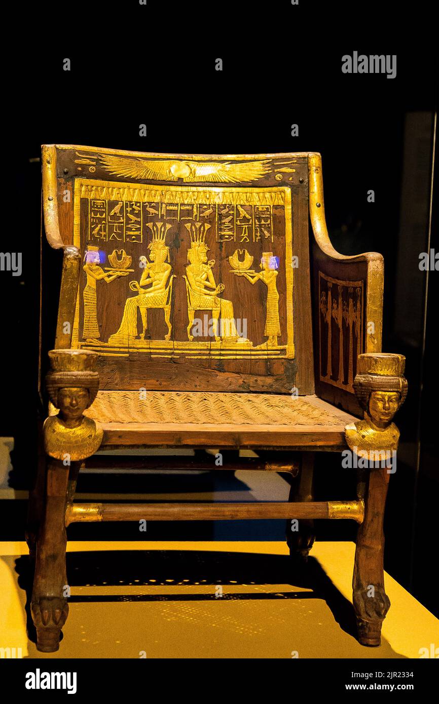 Egypt, Cairo, Egyptian Museum, from the tomb of Yuya and Thuya in Luxor : Wooden chair, with plastered and gilded decorations. The feet are lion paws. Stock Photo