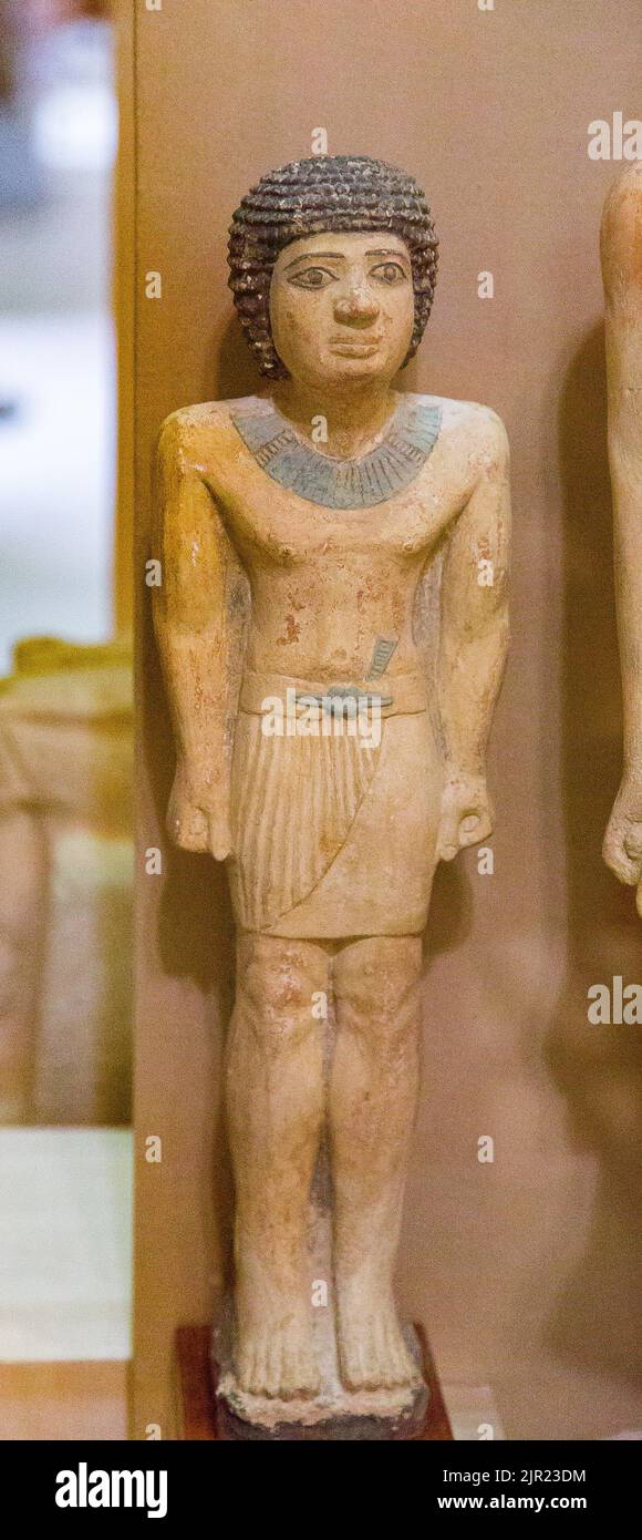 Cairo, Egyptian Museum, statuette of the son of Kanakht, in limestone, from Gizeh. Stock Photo