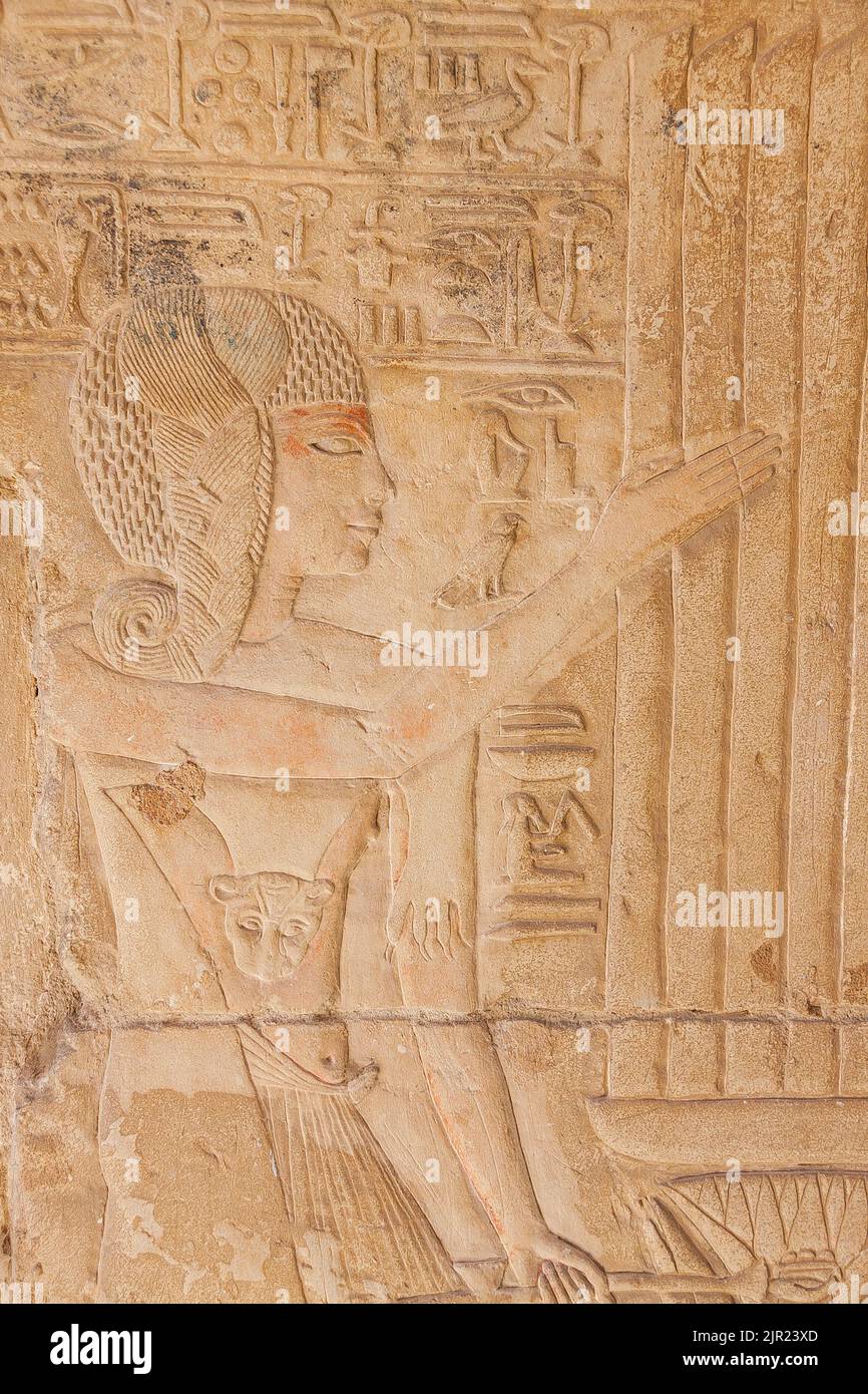 Egypt, Saqqara,  tomb of Horemheb,  statue room, Iunmutef priest censing Horemheb. Stock Photo