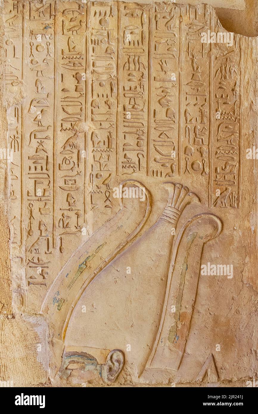 Egypt, Saqqara,  tomb of Horemheb,  statue room, head of Osiris and hymn for this god. Stock Photo
