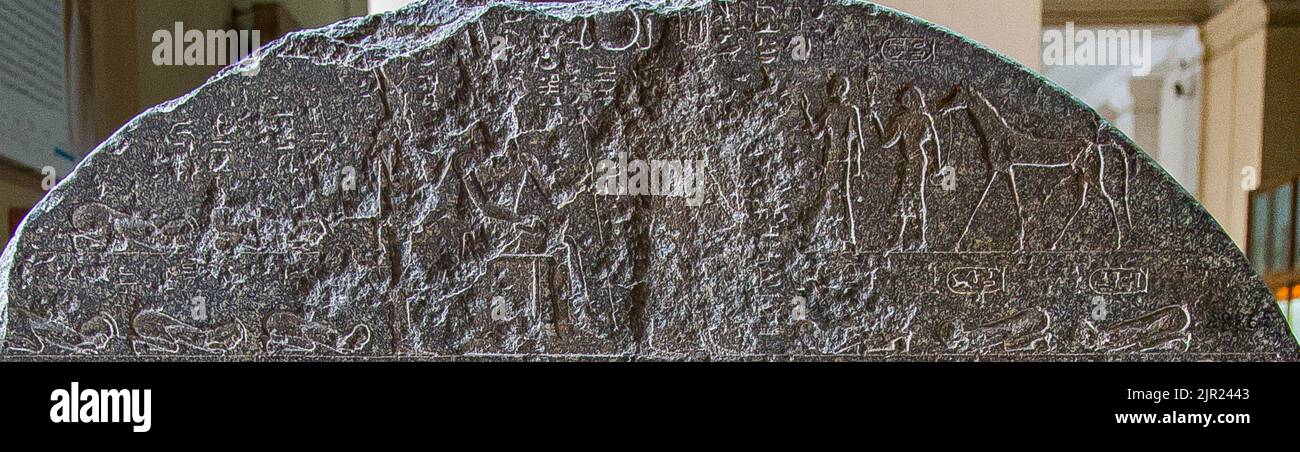 Cairo, Egyptian Museum,  detail of the victory stele of king Piankhy : The prince of Hermopolis  some Egyptian kings and the chiefs of the Ma. Stock Photo