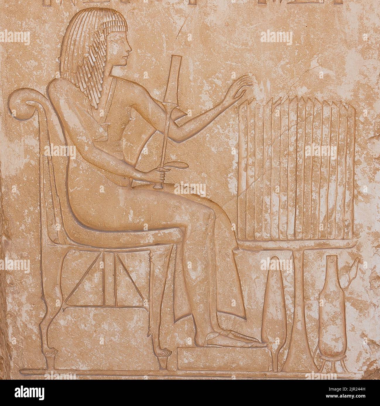 Egypt, Saqqara,  tomb of Horemheb,  statue room,  Horemheb representation, with uraeus. Stock Photo