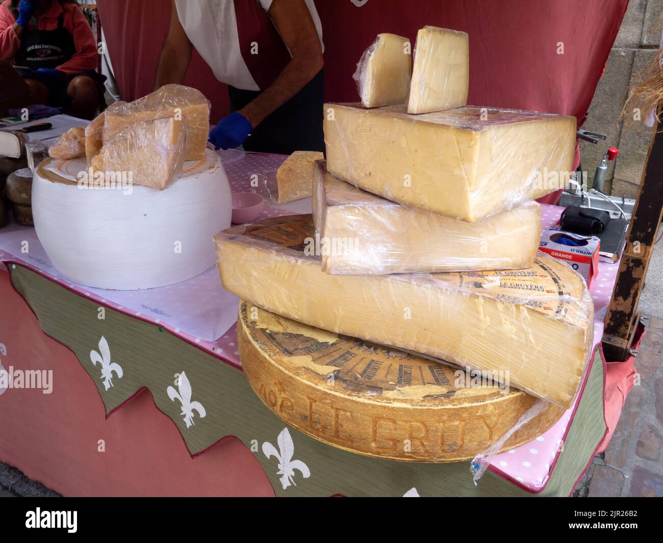 MONDONEDO, SPAIN - AUGUST 14, 2022: Imported gourmet cheese at the medieval fair counter in the old town Mondonedo,Lugo,Galicia,Spain Stock Photo
