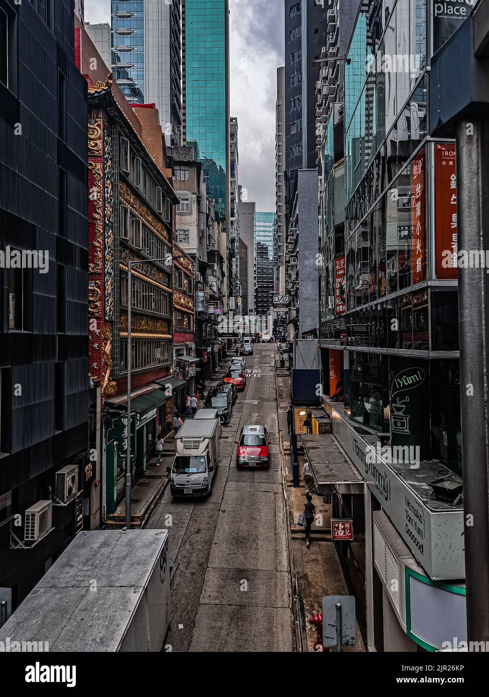 A vertical shot of the central street in Hong Kong, China Stock Photo
